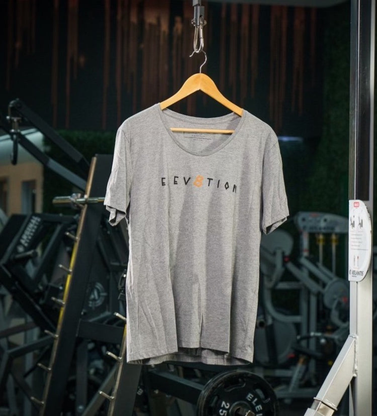 light gray loose fit scoop neck shirt with Elev8tion logo across the chest.