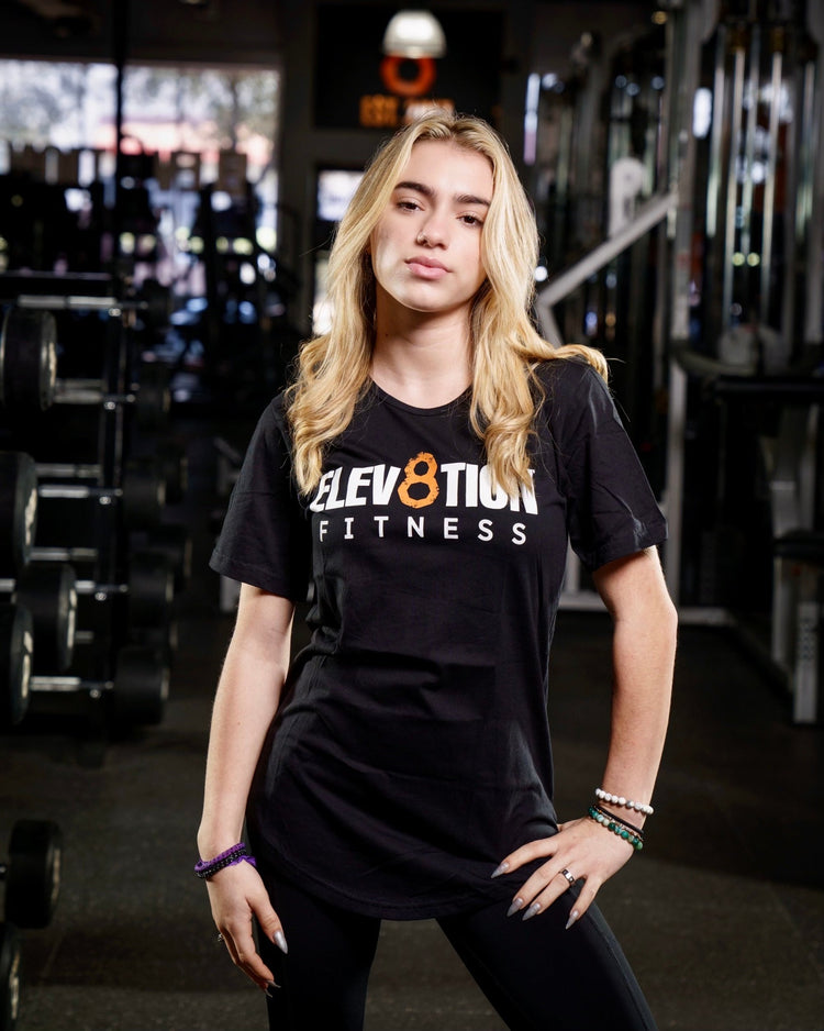 black scoop bottom hem tee with the Elev8tion Fitness logo across the chest