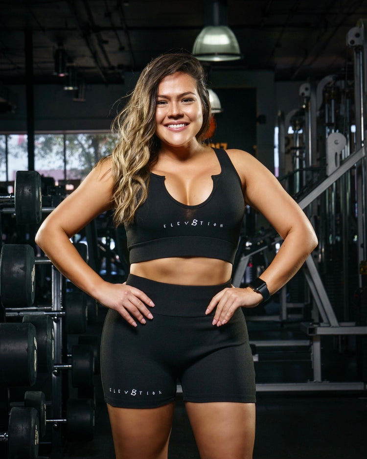 black top and bottom matching workout set for women with the Elev8tion logo