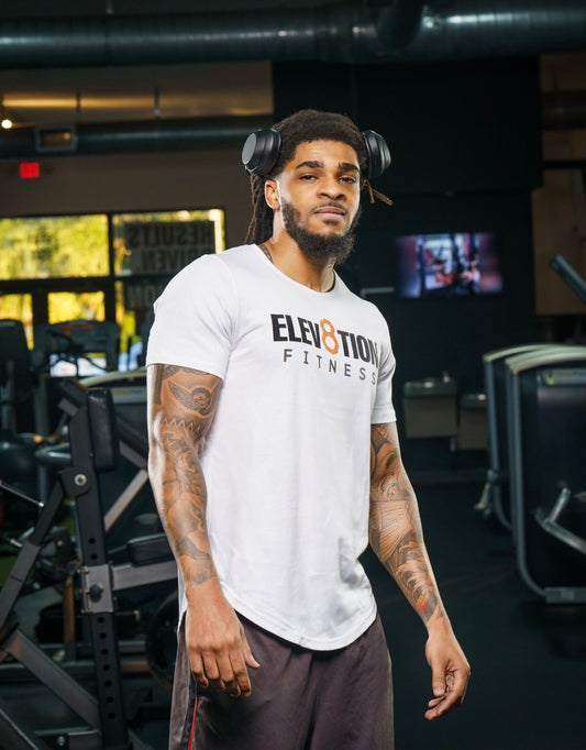 white scoop bottom hem tee with the Elev8tion Fitness logo across the chest